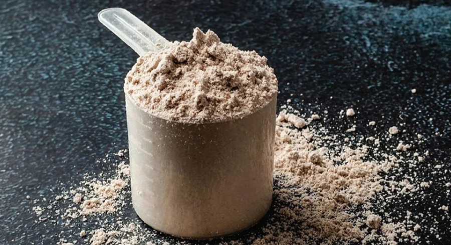 dosador de whey concentrado cheio